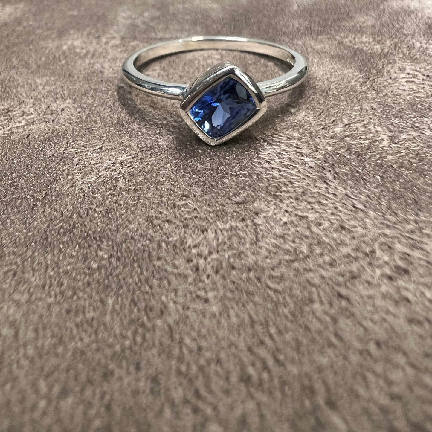 0.69ct Cushion Sapphire.